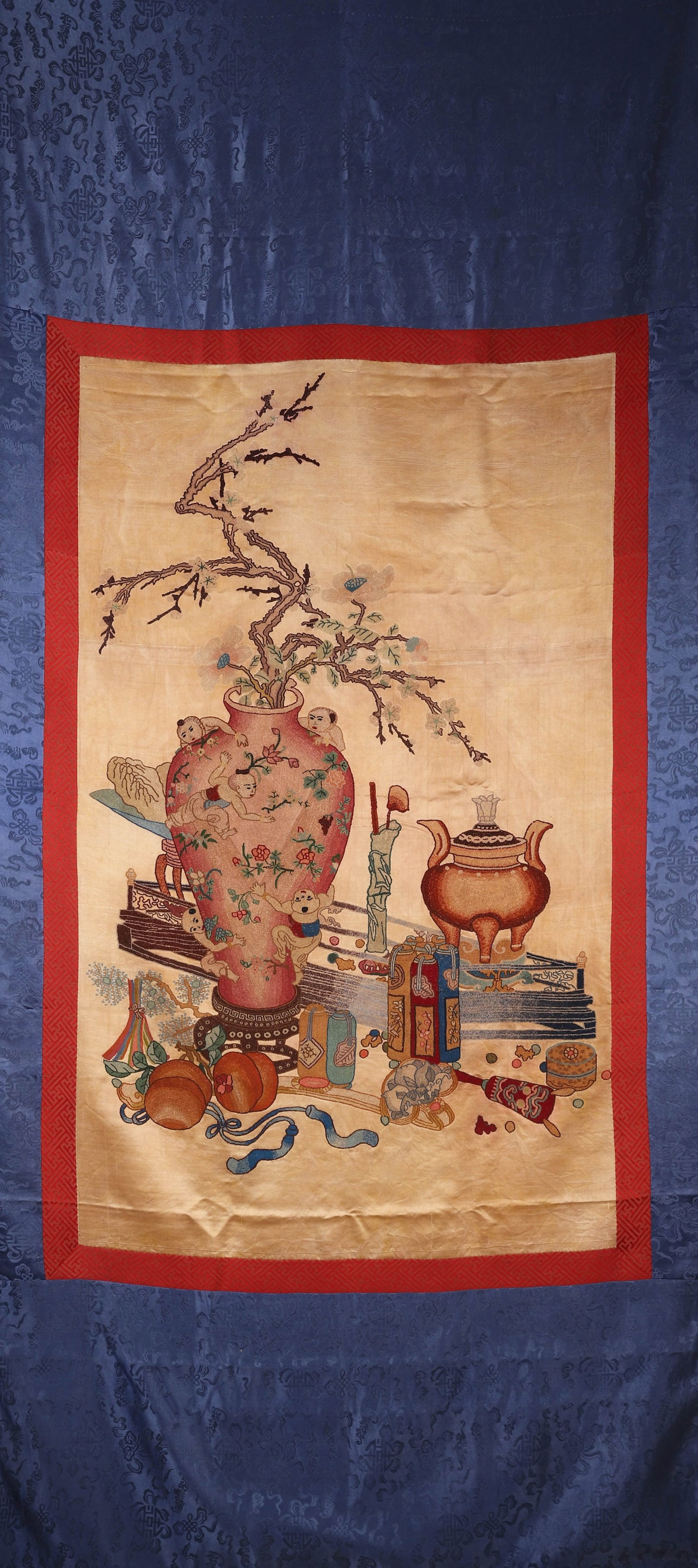 A KESI 'BOGU' HANGING SCREEN: A kesi hanging screen woven with antiquities (bogu) motifs. L. 225 cm; W. 98 cm.