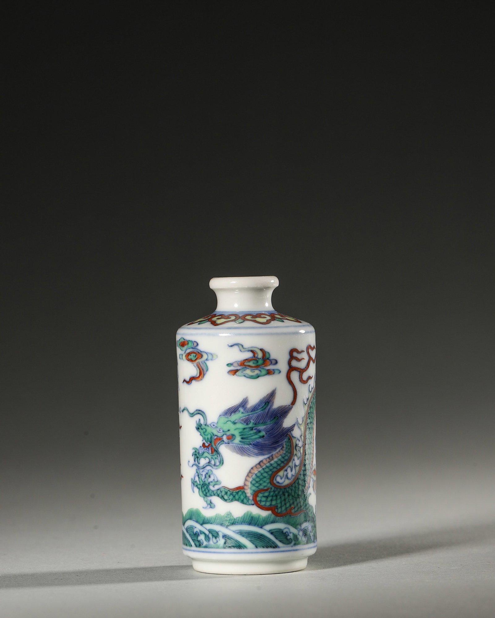 A DOUCAI 'DRAGON' PORCELAIN SNUFF BOTTLE (1 of 6)