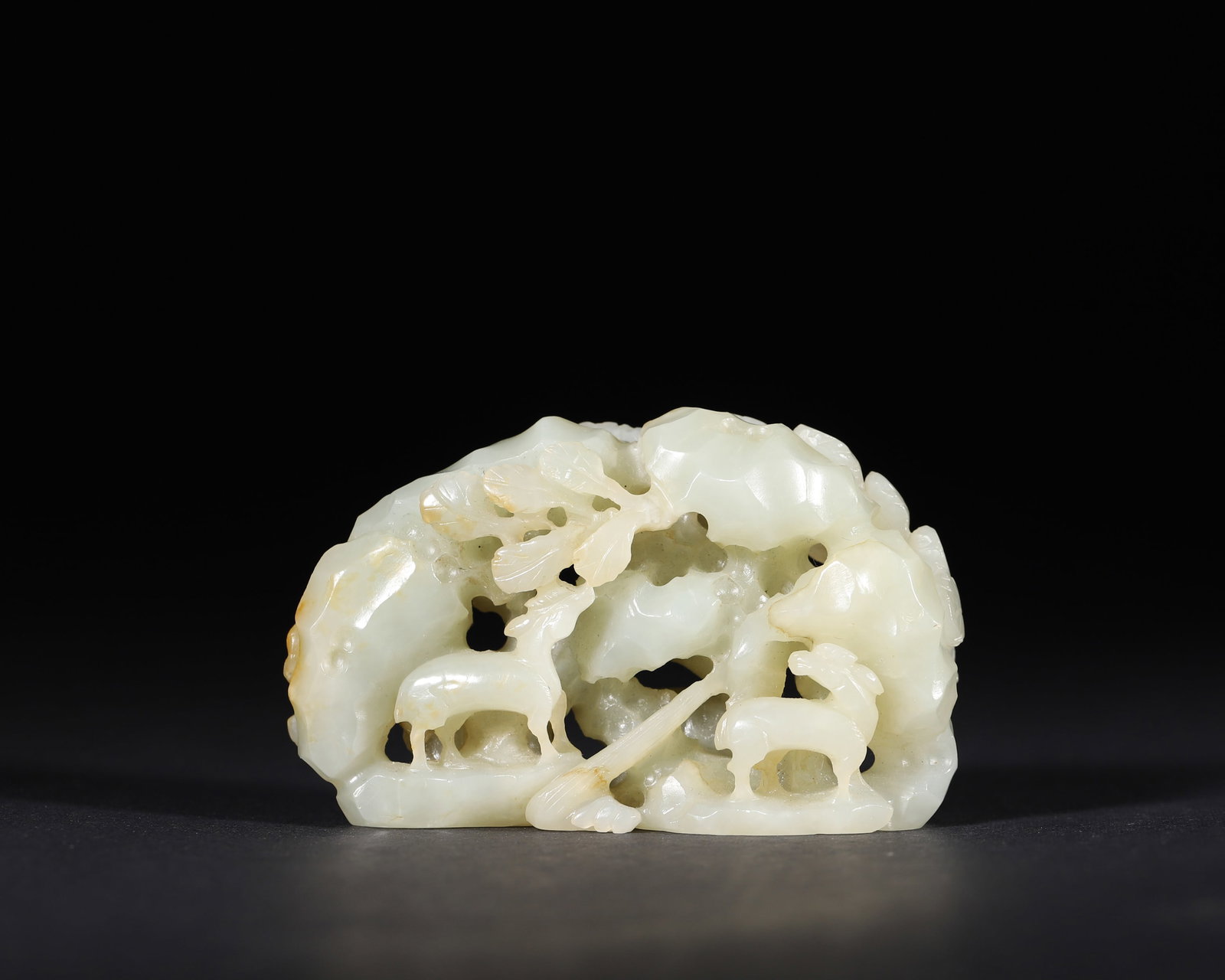 A WHITE JADE OPENWORK 'TWO DEER' MOUNTAIN ORNAMENT (1 of 7)