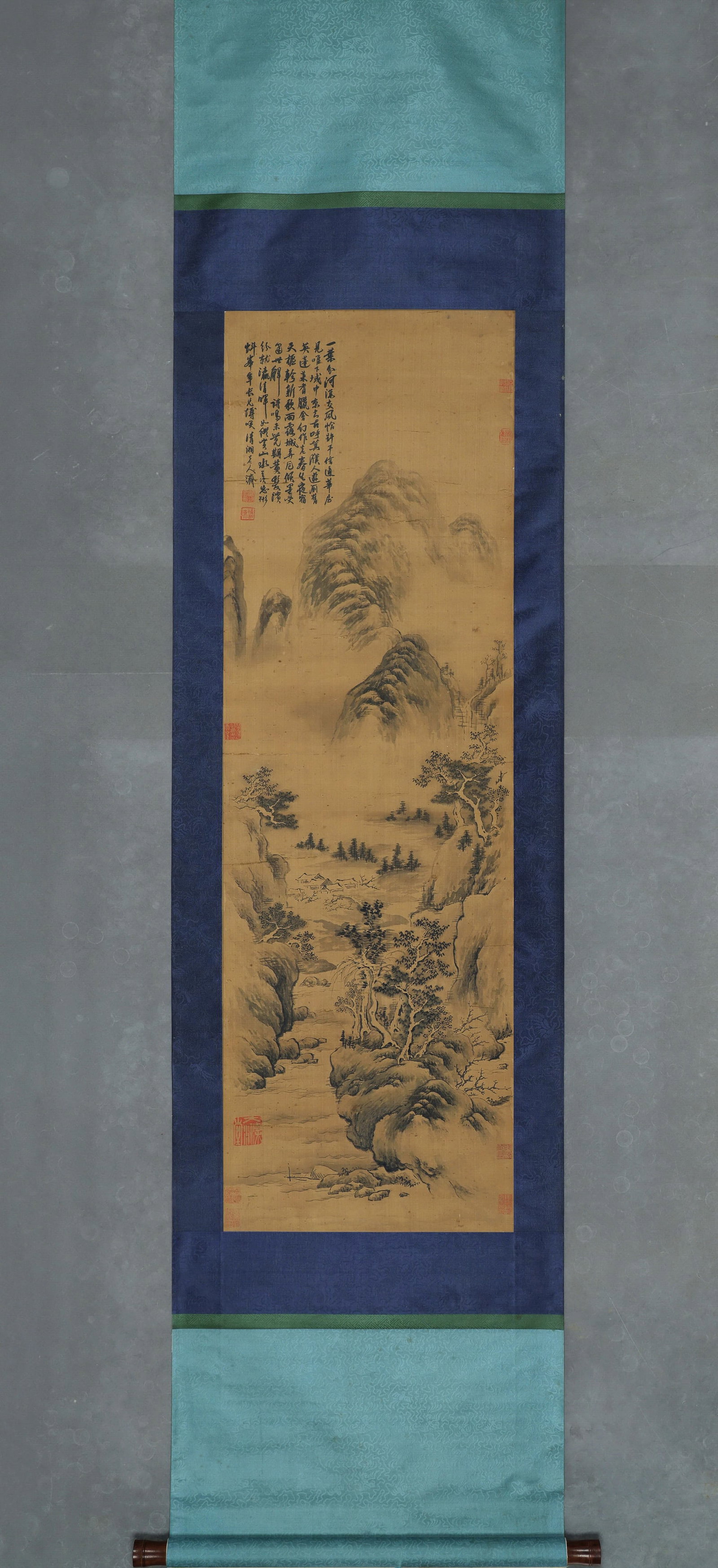 SHITAO, ATTRIBUTED TO, MOUNTAIN LANDSCAPE, HANGING SCROLL: Attributed to Shitao. Ink on silk, hanging scroll, depicting layered mountains, streams, woods and mountain dwellings. The work bears a seven-character poem inscription and multiple seals, with two-to