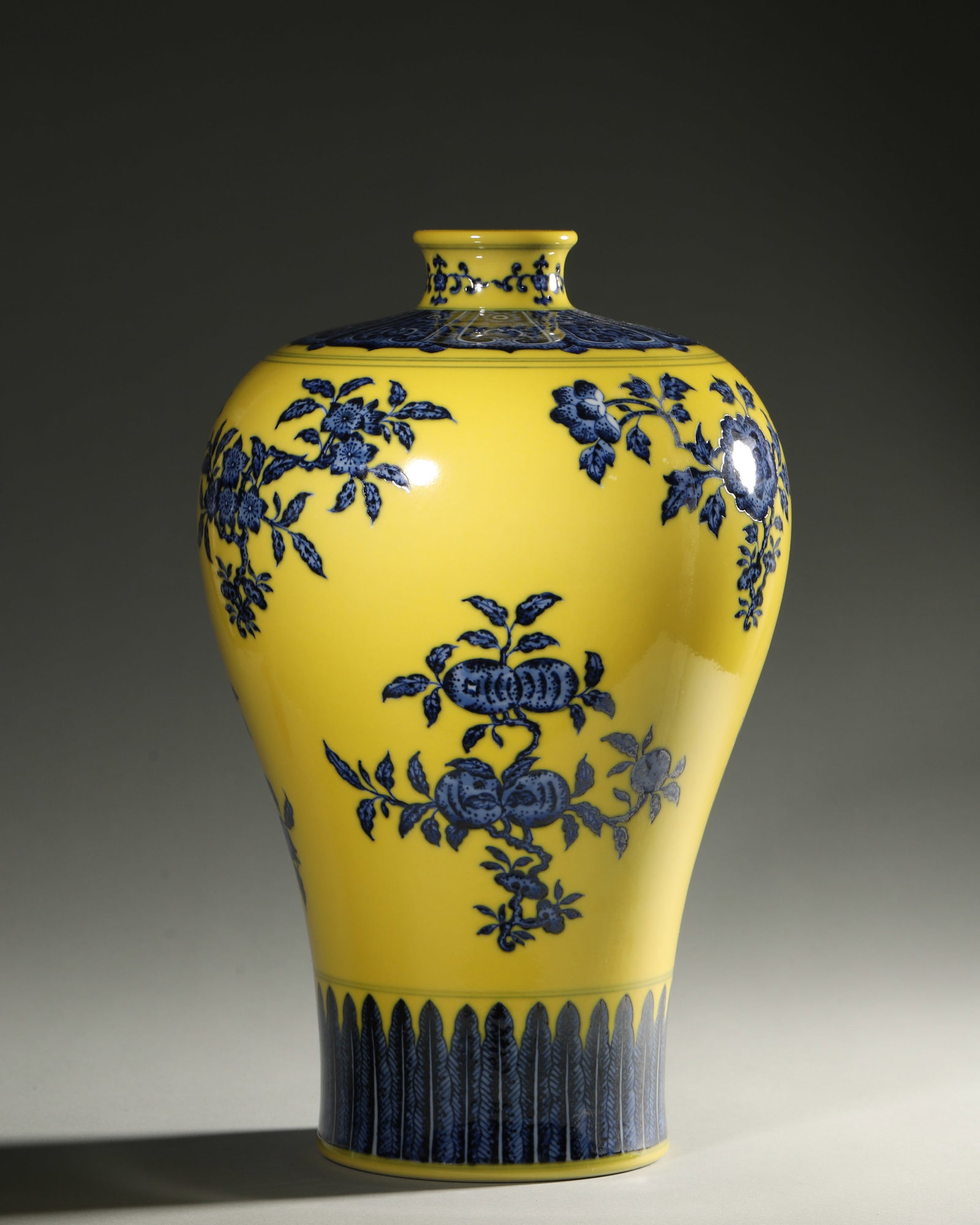 A YELLOW-GROUND BLUE-DECORATED 'FRUIT' PORCELAIN VASE (1 of 7)