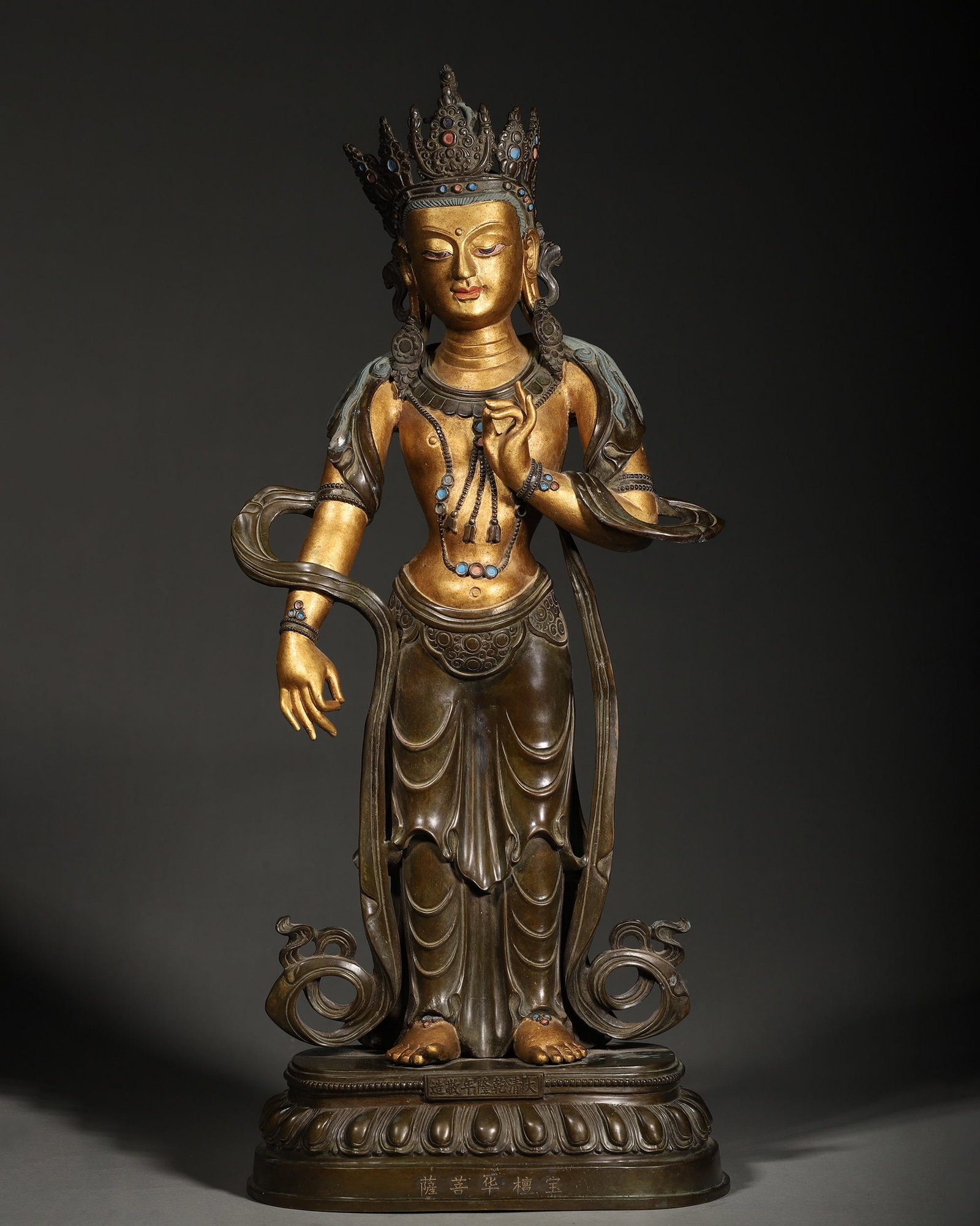 A GILT-BRONZE FIGURE OF GUANYIN: A gilt-bronze figure of Guanyin. L. 25 cm; Ht. 60.5 cm; Wt. 8,740 g.