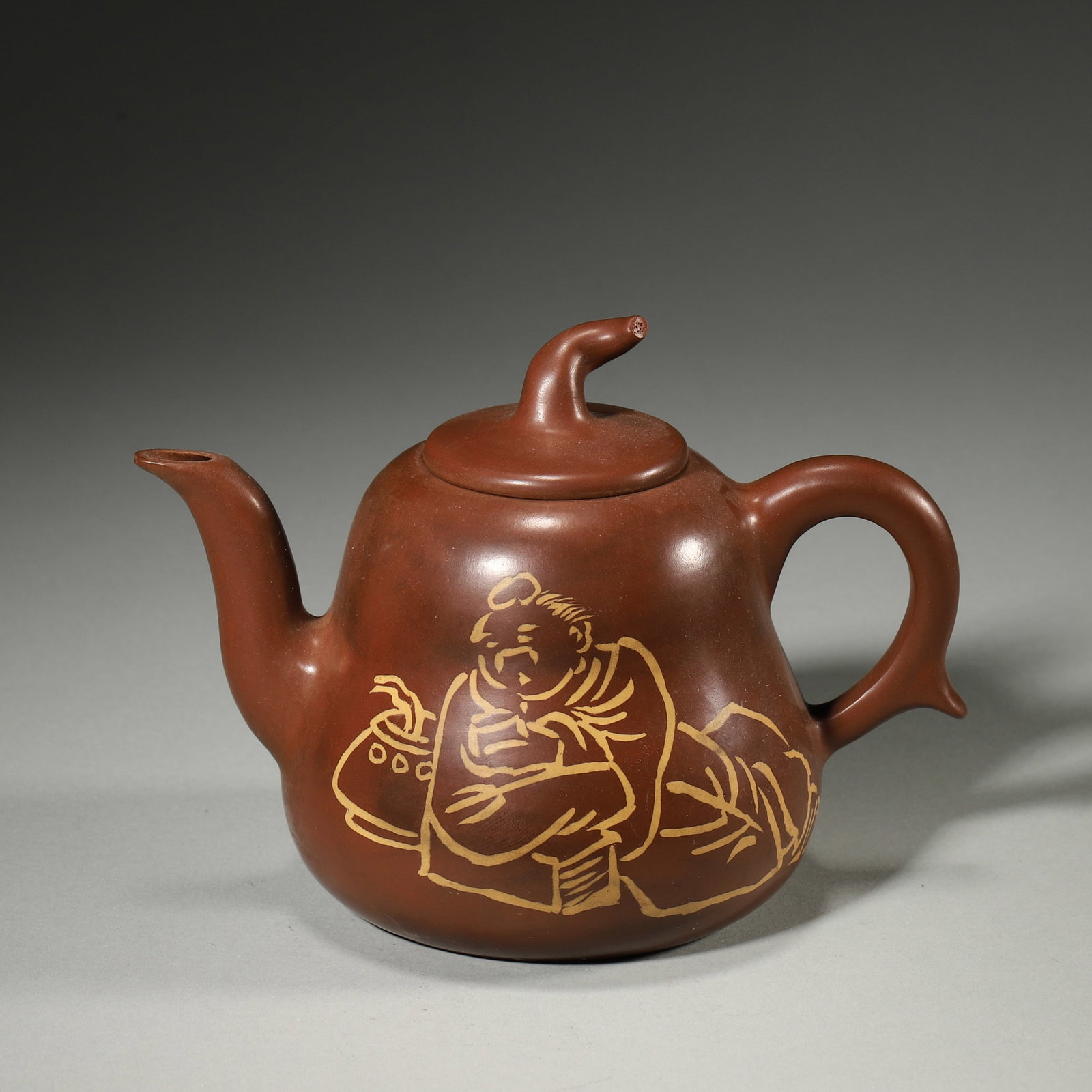 A ZISHA MELON-FORM TEAPOT WITH FIGURE AND POEM: A purple-clay zisha teapot of melon form with a stem-form finial, painted with a scholar preparing tea and a poem inscription. The base bears a seal. L. 15 cm; W. 9 cm; Ht. 10.5 cm.