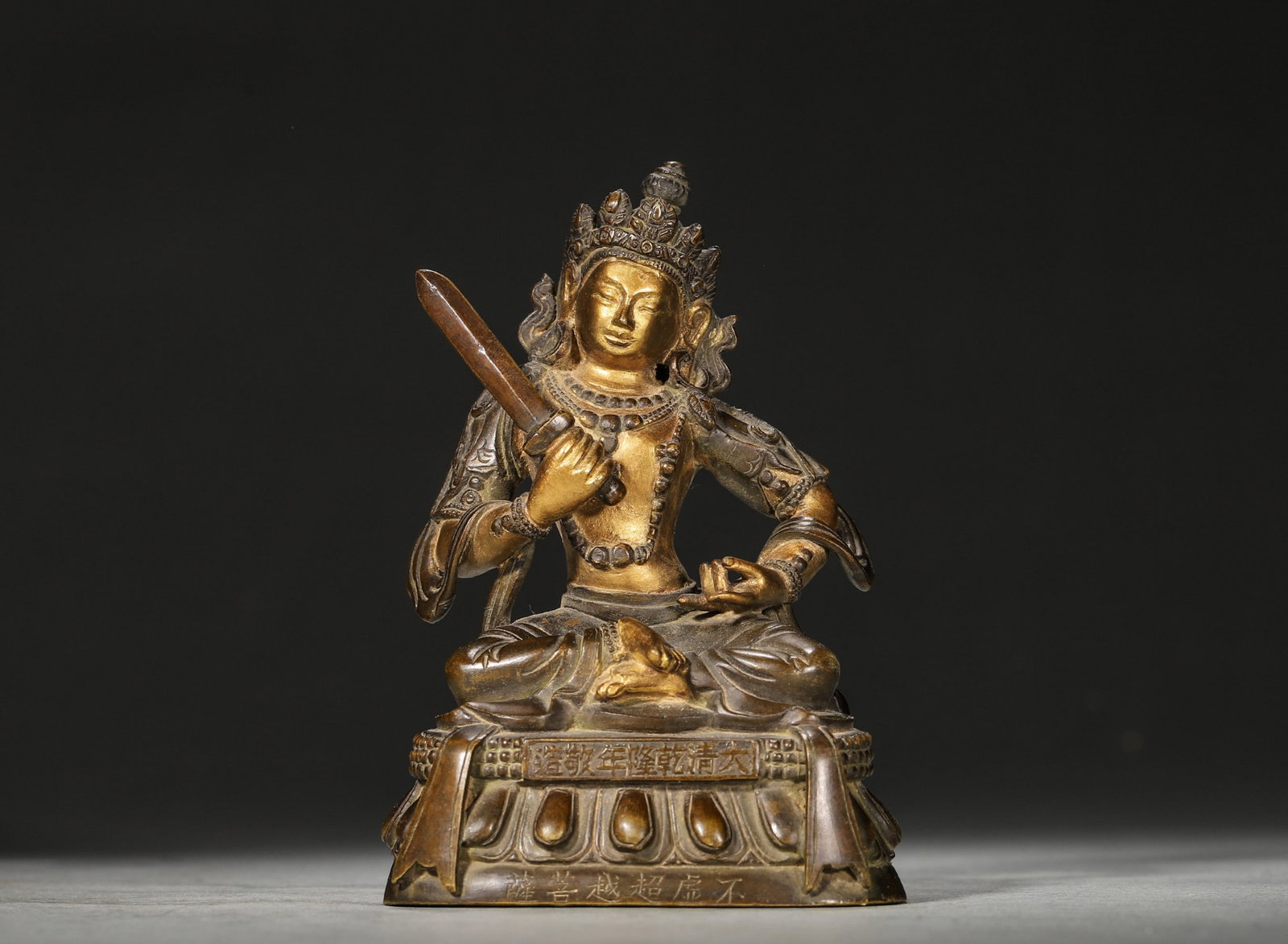 A GILT-BRONZE BODHISATTVA FIGURE (1 of 9)