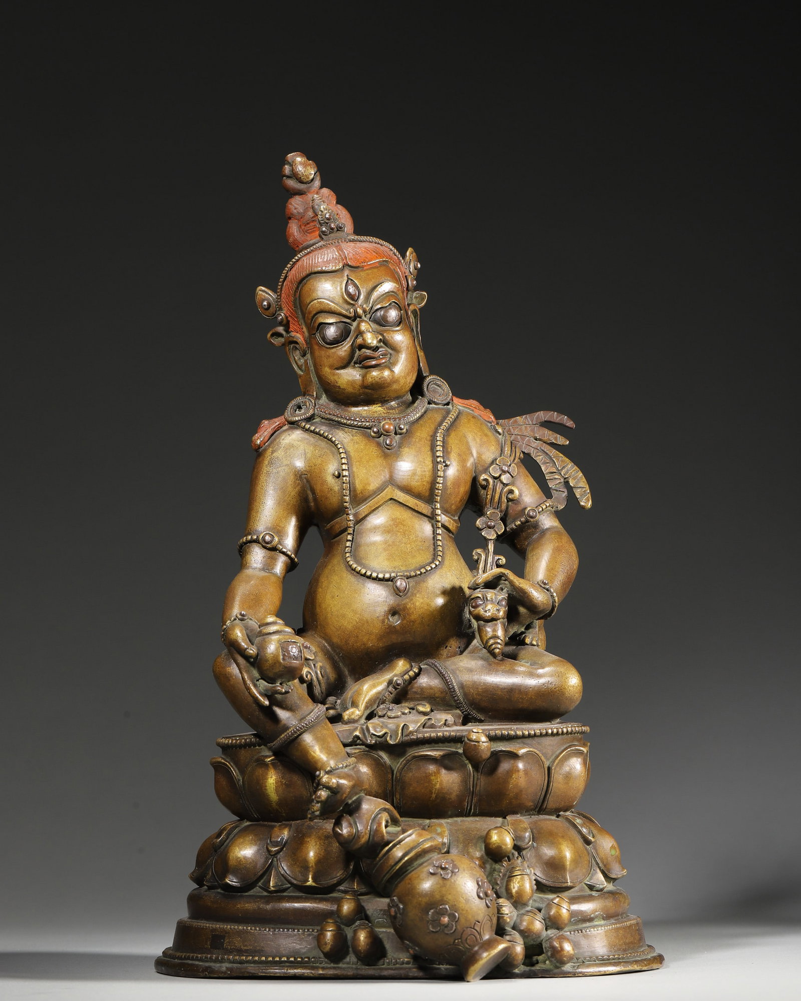 A COPPER-ALLOY FIGURE OF YELLOW JAMBHALA (1 of 9)
