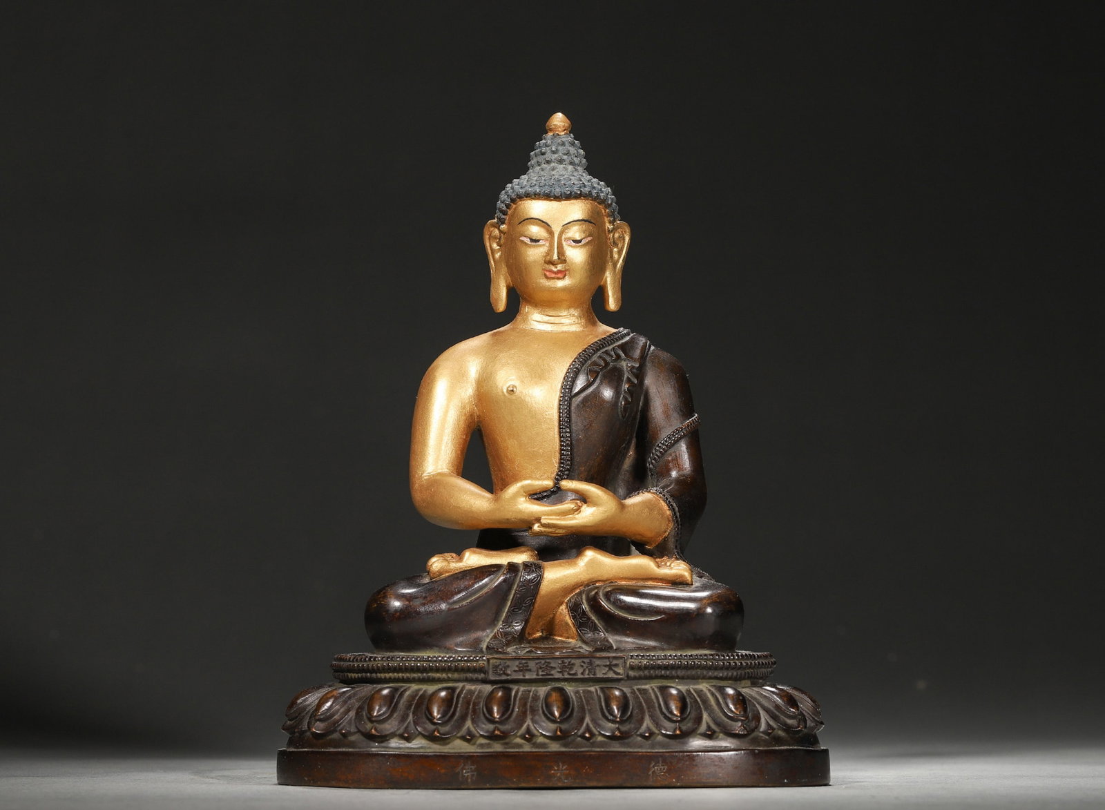 A GILT-BRONZE BUDDHA FIGURE (1 of 10)