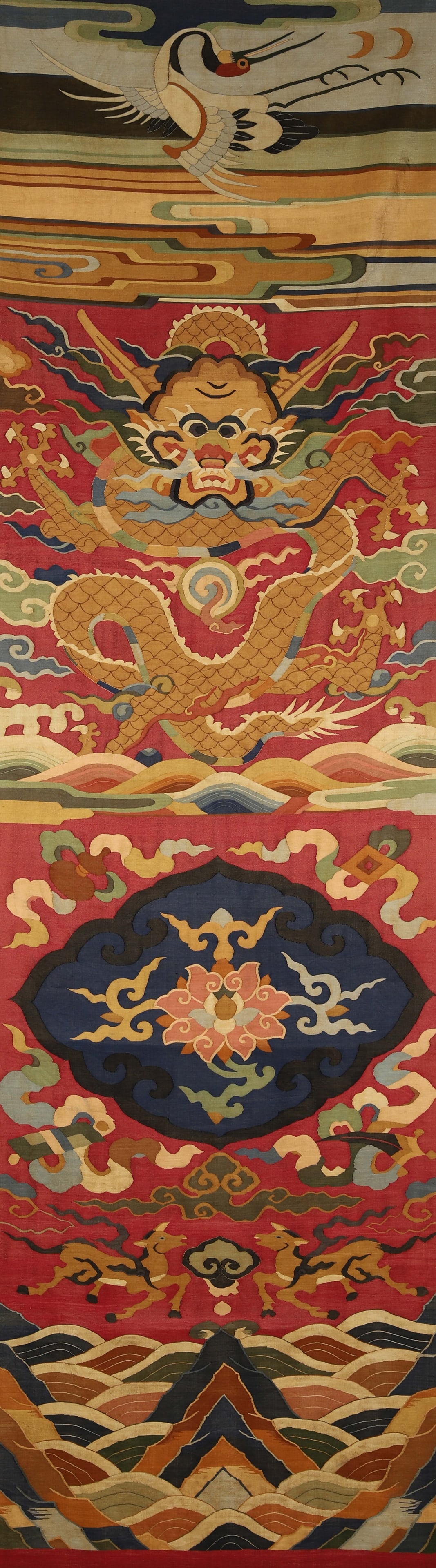 A KESI 'DRAGON' HANGING SCREEN: A kesi hanging screen woven with dragon motifs. L. 171 cm; W. 48 cm.