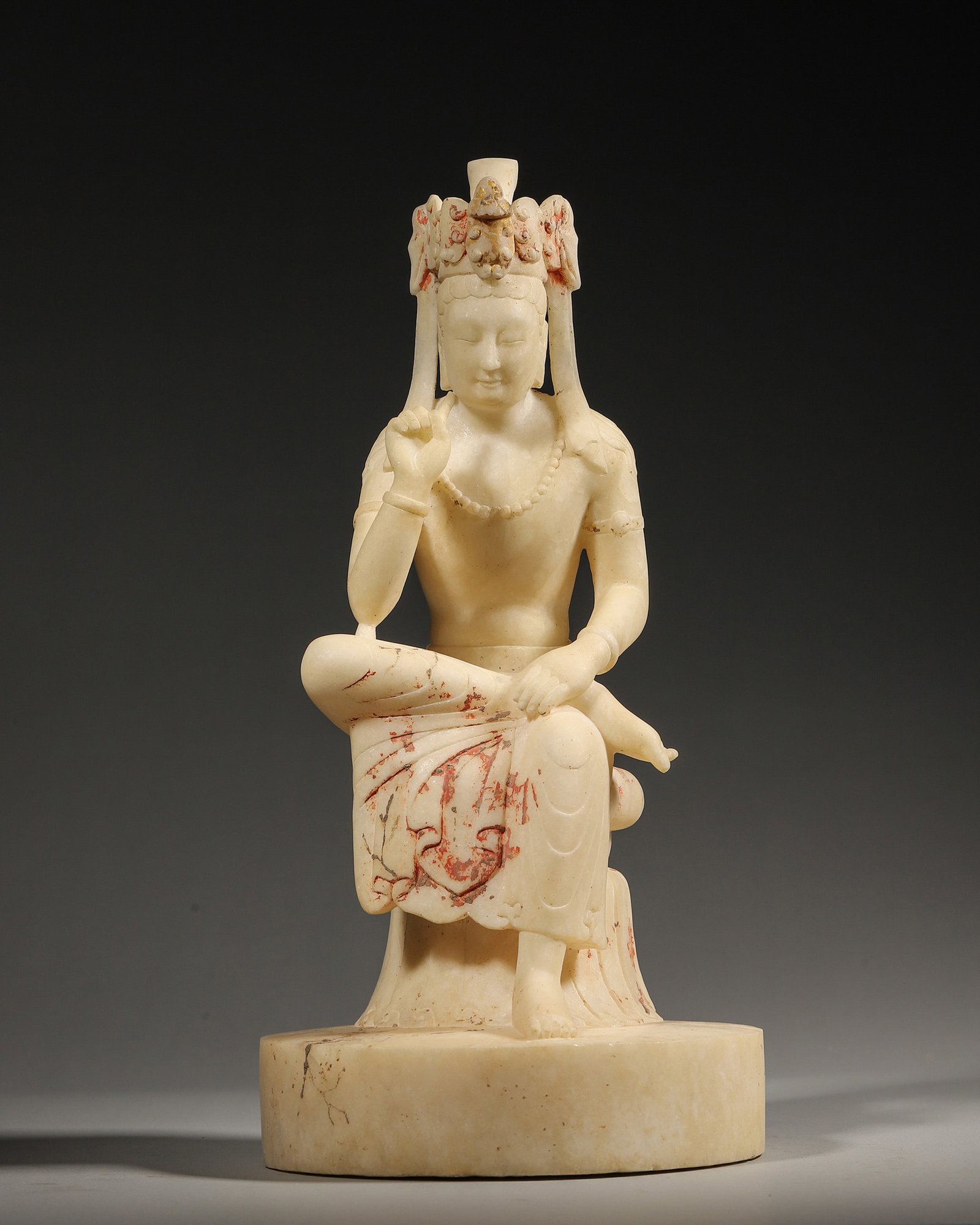 A WHITE JADE FIGURE OF GUANYIN (1 of 9)