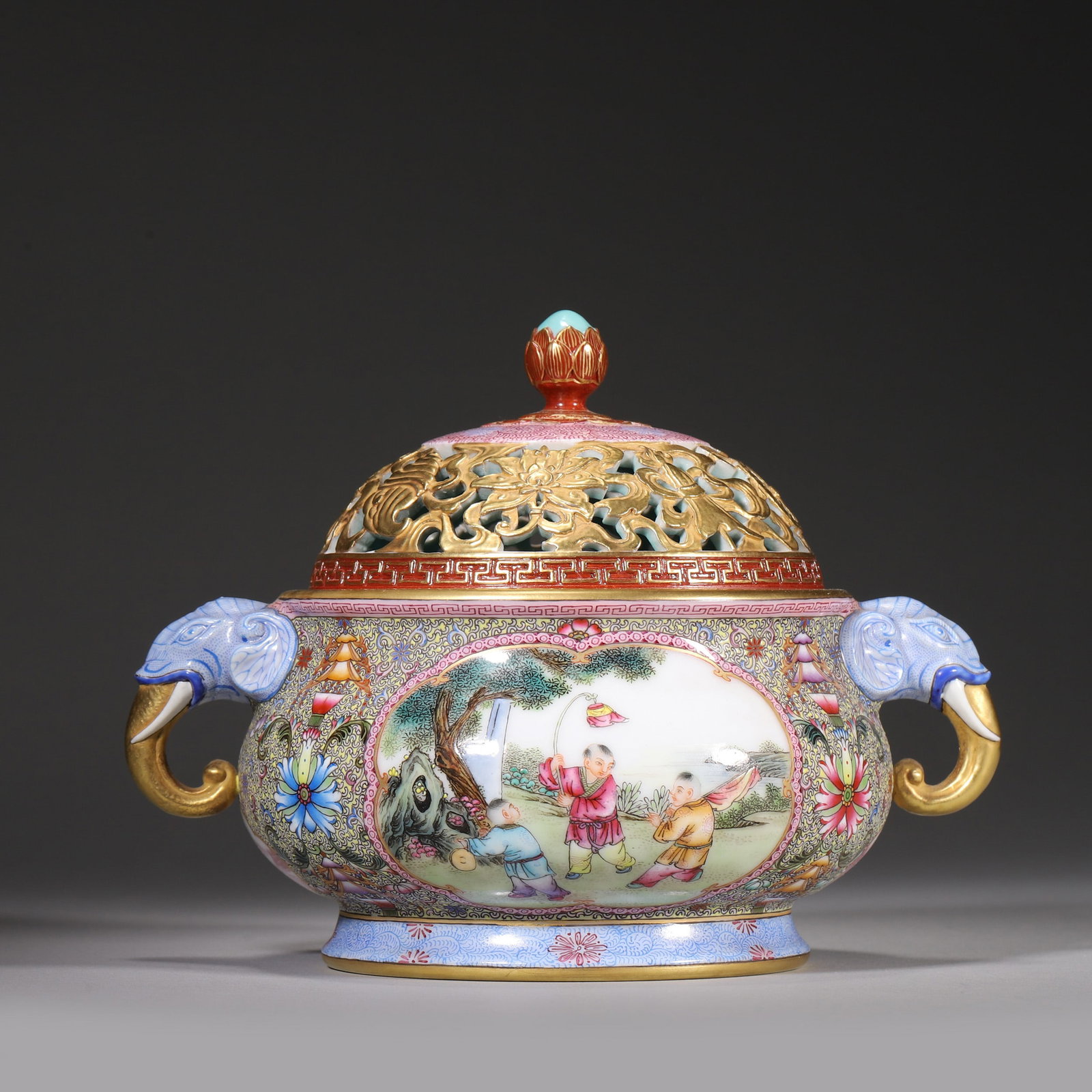 A FAMILLE-ROSE GILT-DECORATED CENSER WITH ELEPHANT HANDLES AND FIGURAL PANELS (1 of 9)