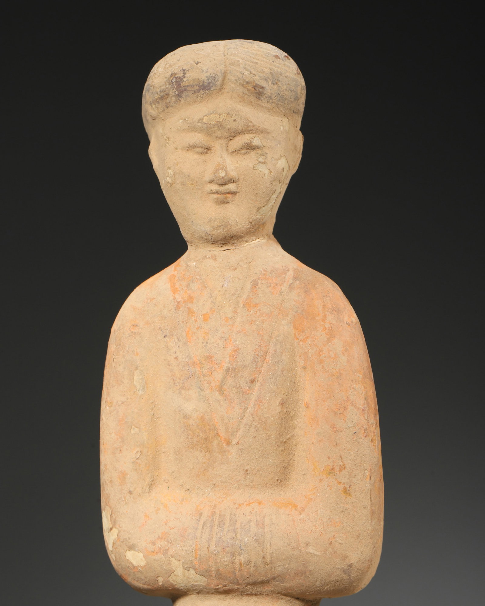 A POTTERY FIGURE - 3