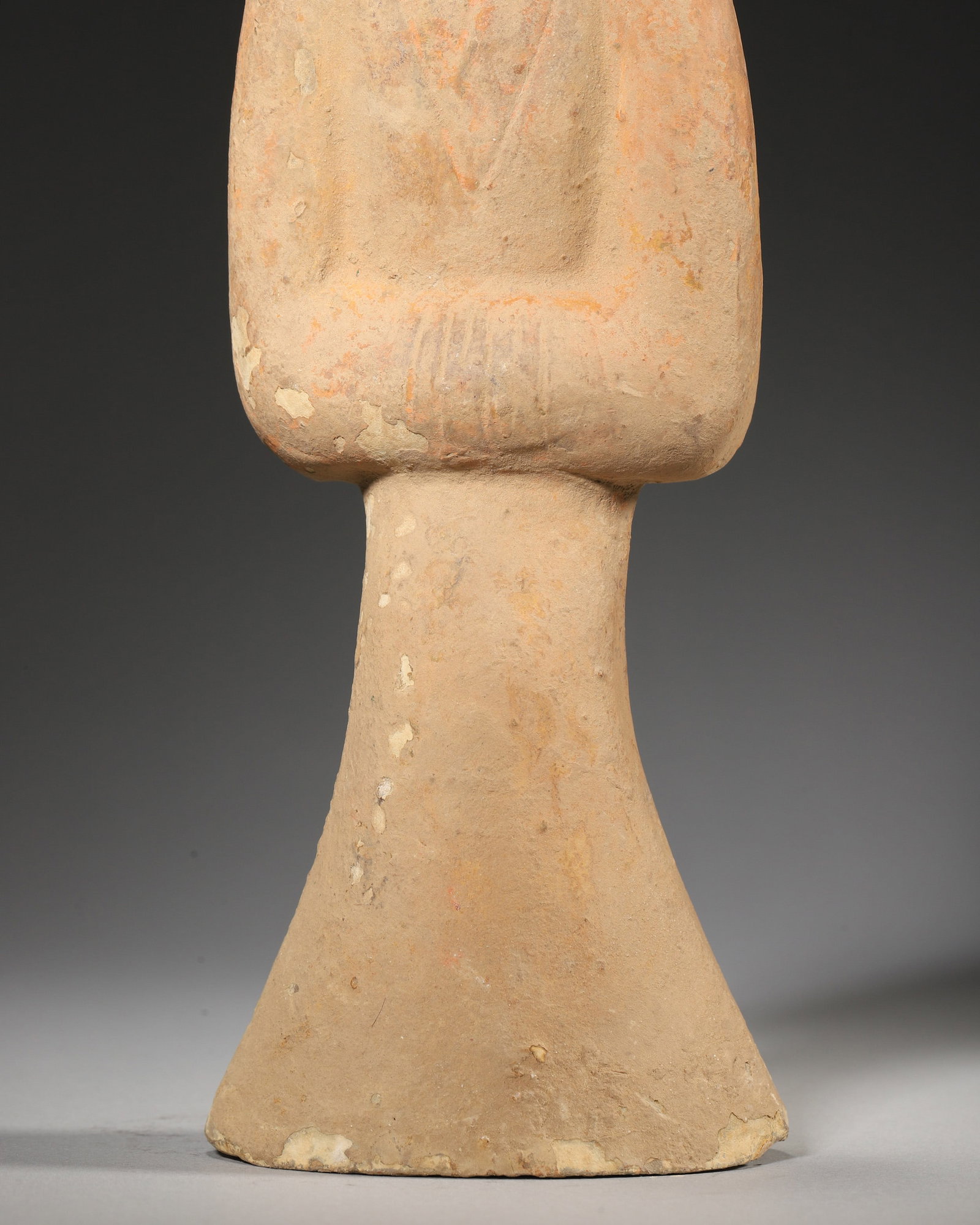 A POTTERY FIGURE - 4