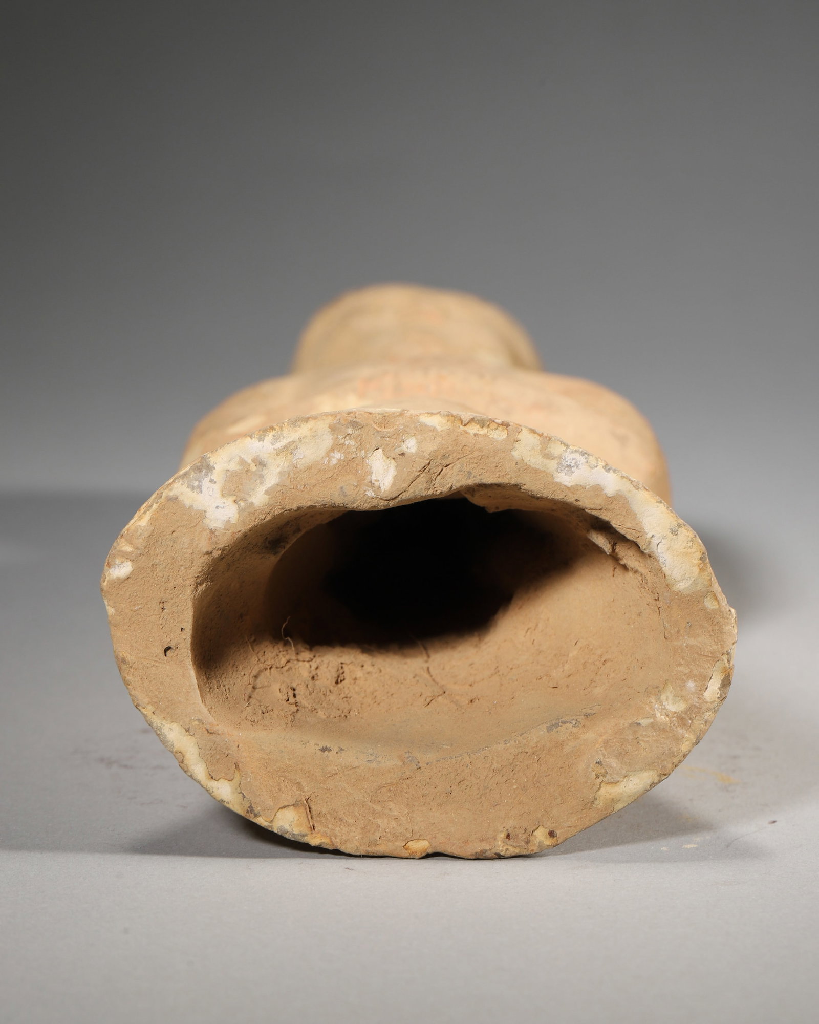 A POTTERY FIGURE - 8