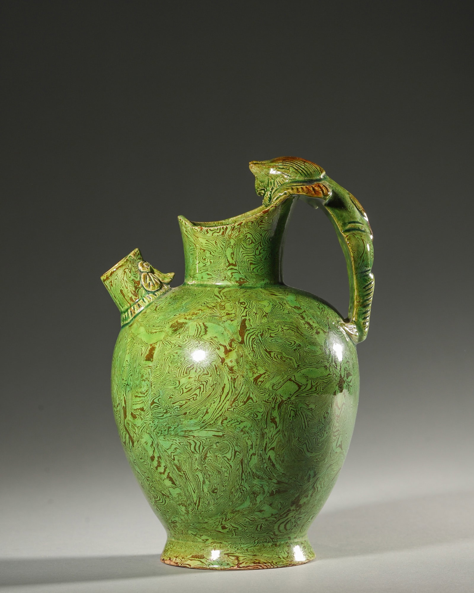 A MARBLED-GLAZE PORCELAIN EWER (1 of 7)