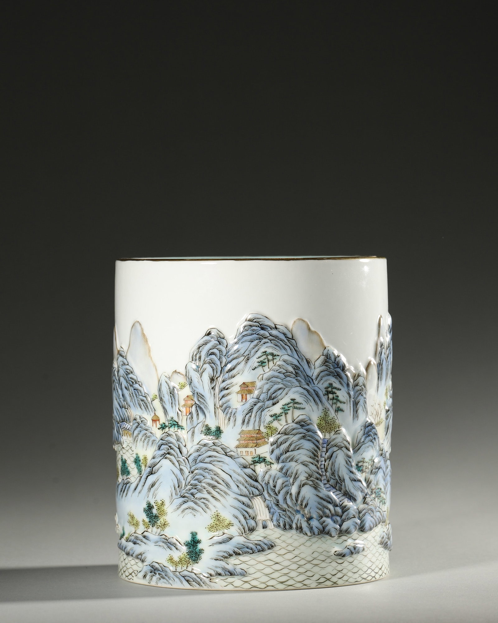 A FAMILLE-ROSE RELIEF LANDSCAPE BRUSH POT (1 of 7)