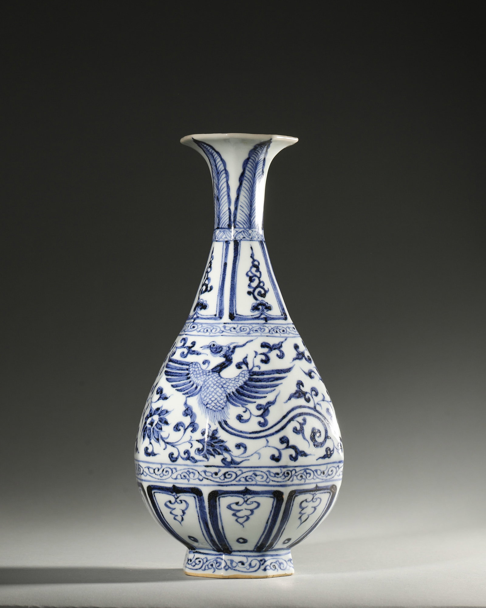 A BLUE-AND-WHITE 'QILIN AND PHOENIX' PORCELAIN VASE (1 of 6)