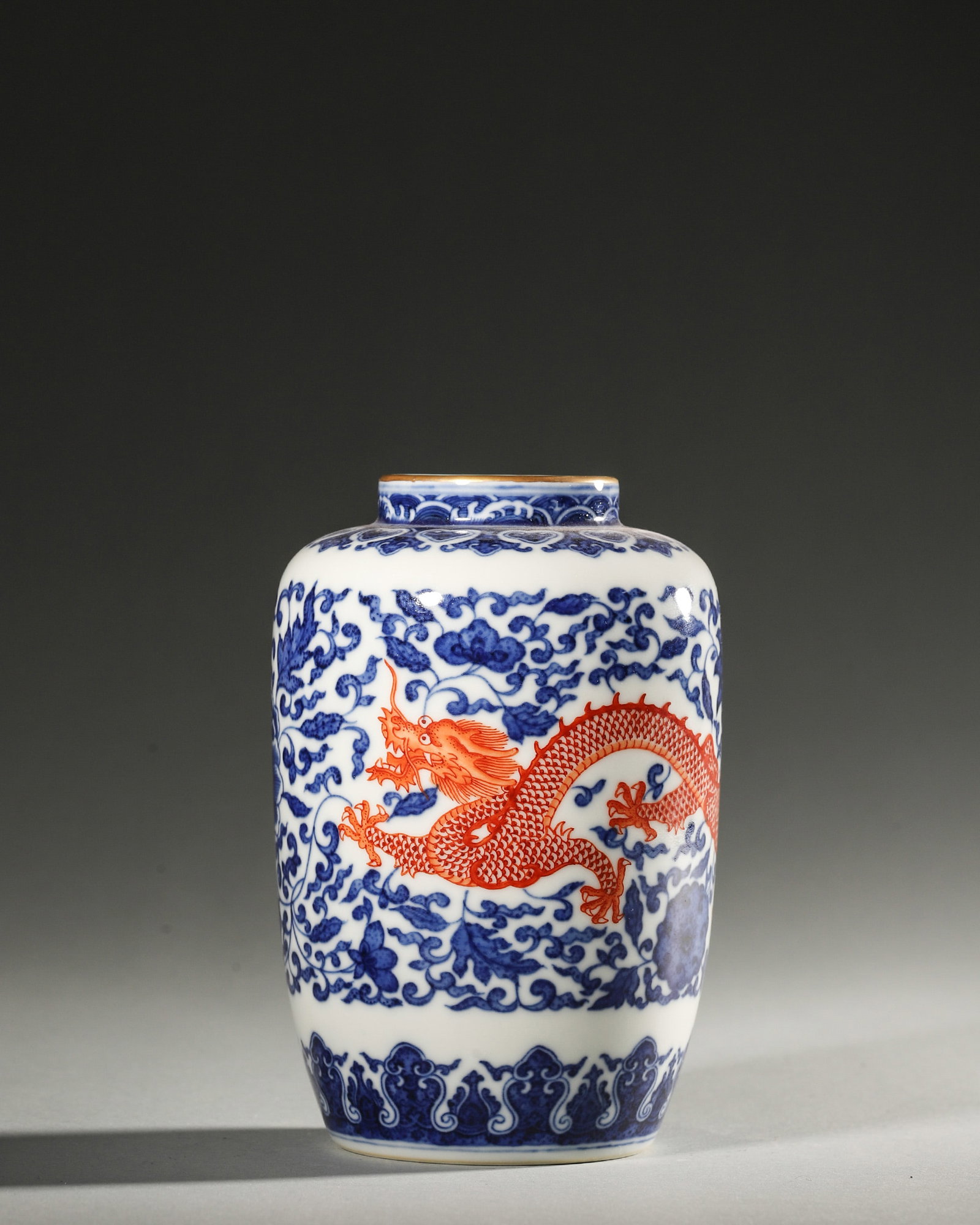A BLUE-AND-WHITE AND IRON-RED 'DRAGON' PORCELAIN VASE (1 of 6)