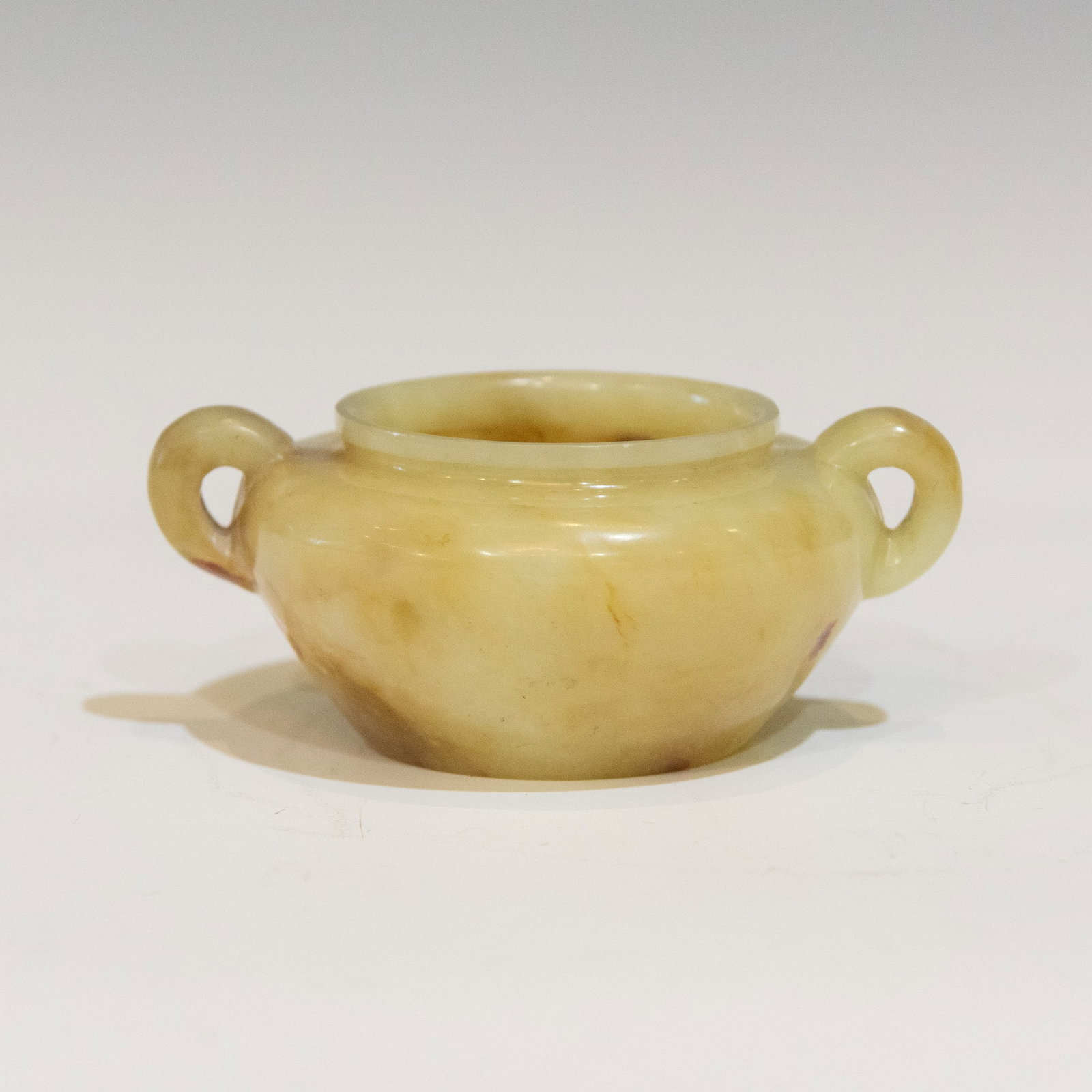A JADE WATER POT: A jade water pot. H4.5 x 10 x 8 cm