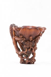 Carved Horn Landscape Statue: Beautiful open work carved Horn statue with the design of landscape scenery, of tree branches, plants, and flowers. Length 5.25" Width 4" Height 5.5"