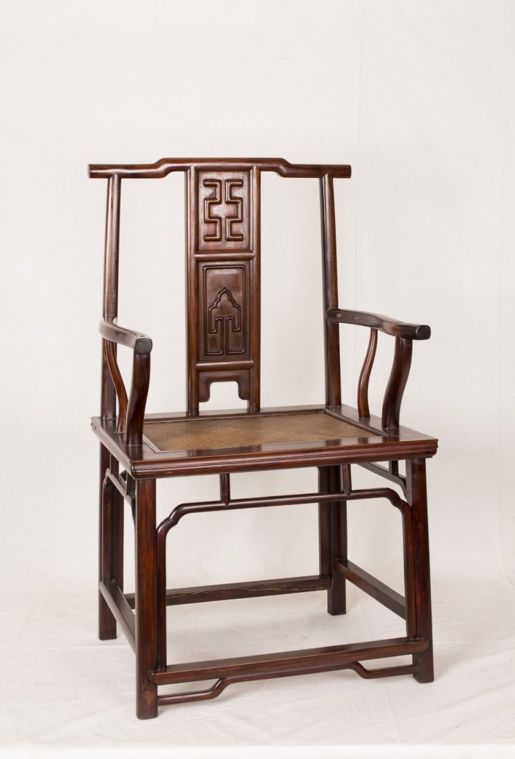 Huanghuali or rosewood Chair,18/19 Century: Huanghuali or rosewood Chair, the seat is of square shape, with delicately carved back, arms embellished with beautiful curved pattern, feet united by a square stretcher, with decorative rails, of exq