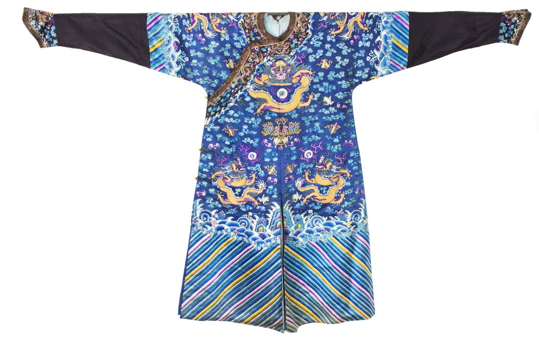 Chinese Blue Silk Embroidered 'Dragons' Robe: Chinese blue silk embroidered imperial style 'Dragons' robe, the front with the design of three writhing dragons and flaming pearls amid clouds, all above waves and a typical Lishui border on navy blu