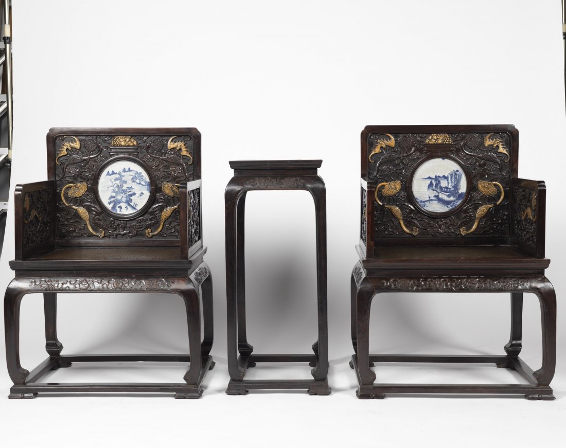 Set of Chinese Zitan Throne Chairs and a side table: A set of Chinese Zitan Throne Chairs and a side table, featured carved longevity bats, auspicious ruyi and Shou medallion amidst clouds in Boxwood, inlaid with two blue and white round porcelain plaqu
