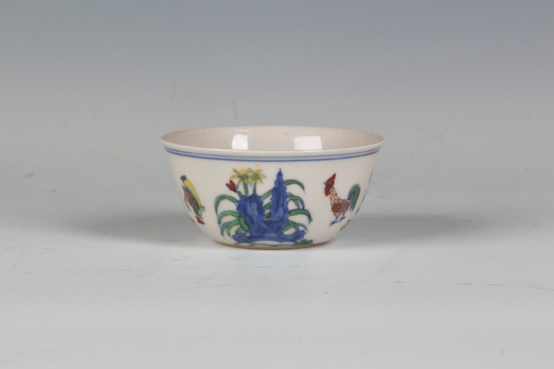 Chinese Dou Cai Glaze Bowl: Chinese Glazed Bowl with white base and colorful rooster and flowers. Signed and with seals on the bottom. Diameter 3.25" Height 1.5"