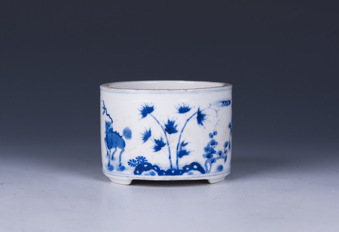 Chinese Blue and White Porcelain Brush Washer: Chinese Blue and White Porcelain Brushwash with a phoenix flying amid clouds above the treetop. Signed and with seals on the bottom. Diameter 4" Height 2.75"