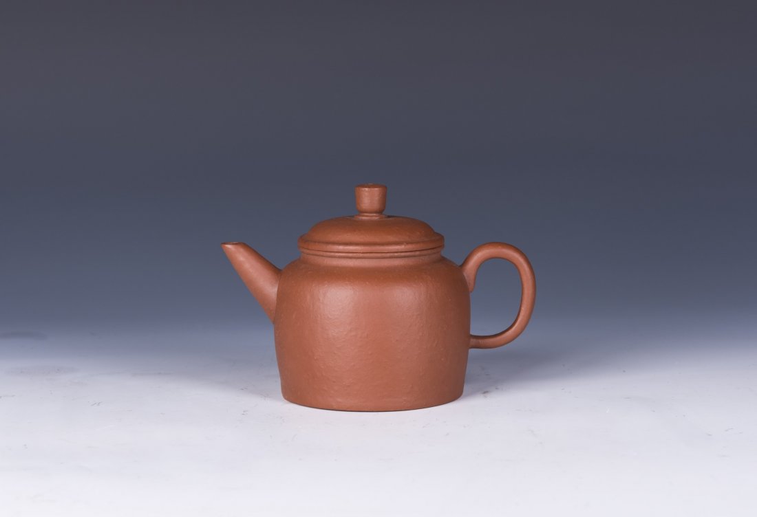 Red clay Zisha Teapot: Red clay Zisha Teapot with fruity design. Signed and seals on the bottom. Length 6" Width 3.75" Height 4"