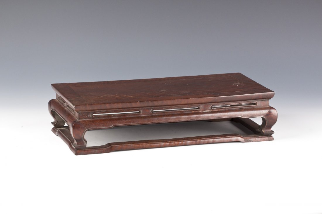 Small Wood Teatable: Small Wood Tea Table with rounded leg and Natural wood texture on the surface. Length 15.25" Width 7.75" Height 3.75"