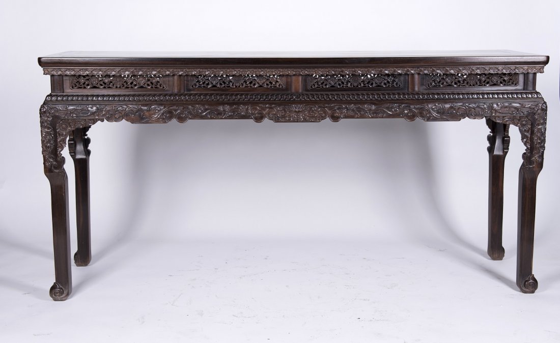 Zitan or Hardwood altar table: Large Zitan or Hardwood altar table, rectangular, exquisite openwork carving. The carving depicts Chinese traditional auspicious patterns. Length 69.25" Width 20.5" Height 34"