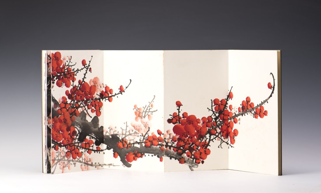 A CHINESE PAINTING ALBUM OF PLUM FLOWER MOTIF: A Chinese Painting album of plum flowers, total 9 pages attributed to Guan Shanyue. Width 6.75" Length 11.5"