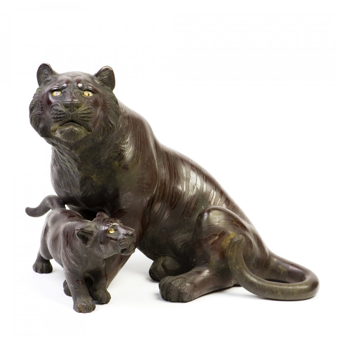 A JAPANESE TIGER STATUE, 20TH CENTURY: A JAPANESE TIGER STATUE, 20TH CENTURY Height 6.75 in. (17.14 cm.) Width 8 in. (20.32 cm.)