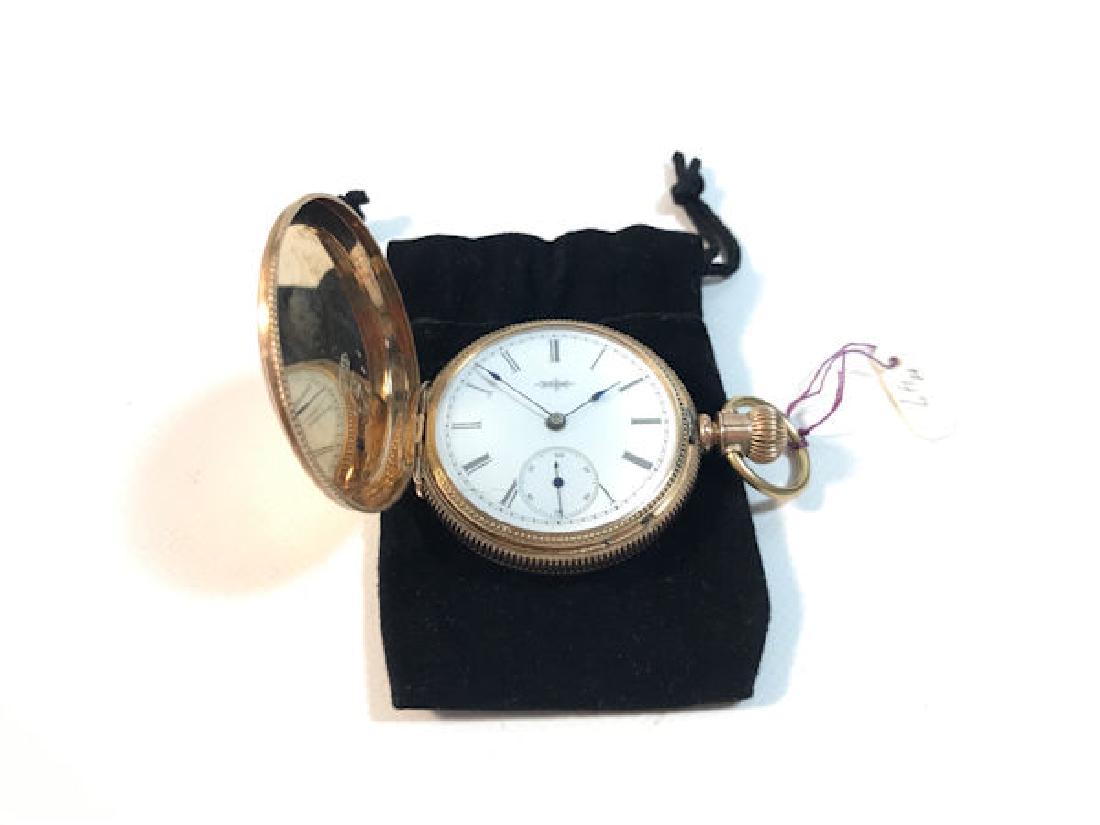 VINTAGE ELGIN POCKET WATCH ~ SMALL 1.5" IN DIAMETER.: VINTAGE ELGIN POCKET WATCH ~ SMALL 1.5" IN DIAMETER. ART NOUVEAU STYLE EMBOSSEDCASE FROM DUEBER. WHITE FACE W/ROMAN NUMERAL INDICATORS. MOVEMENT NUMBERED2176493.