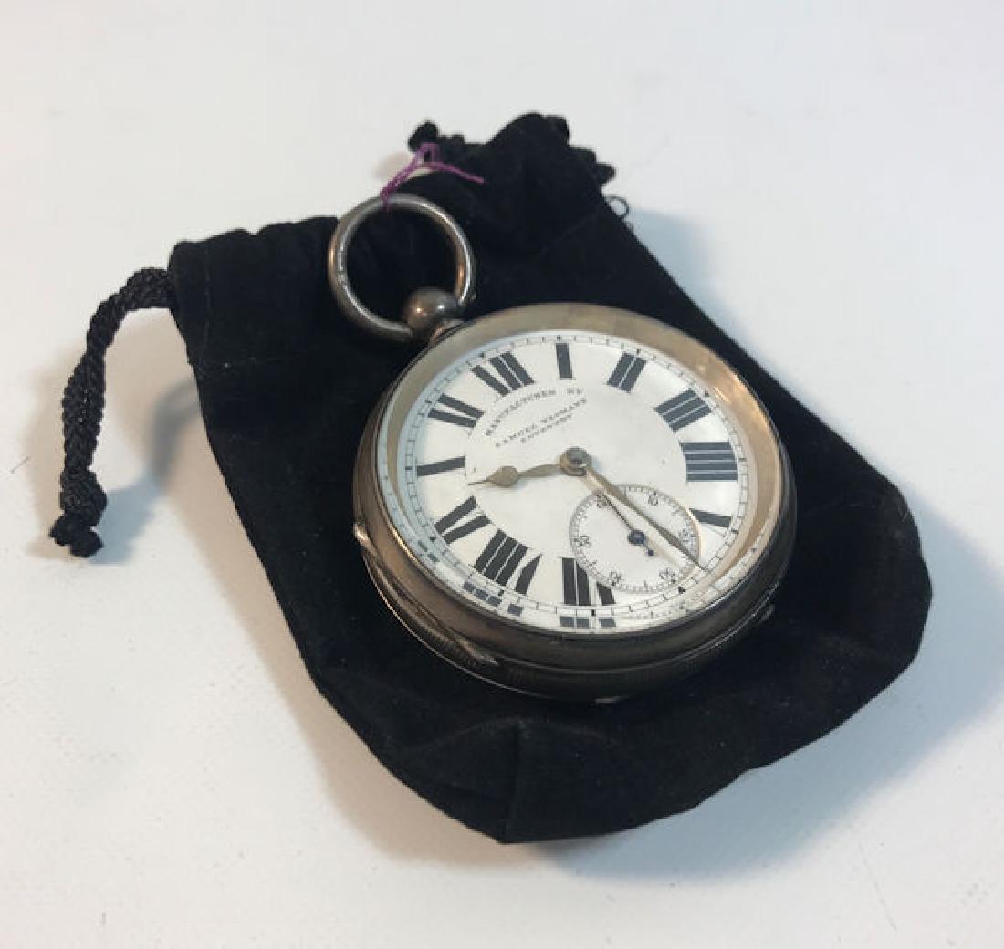 SAMUEL YEOMANS COVENTRY POCKET WATCH ~ 2.25" IN: SAMUEL YEOMANS COVENTRY POCKET WATCH ~ 2.25" IN DIAMETER. WHITE FACE W/BOLDROMAN NUMERAL INDICATORS AND SECOND DIAL. ENGLISH MADE STERLING SILVER CASE(LION PASSANT STAMPED) NUMBERED 87387. KEY WIND MO