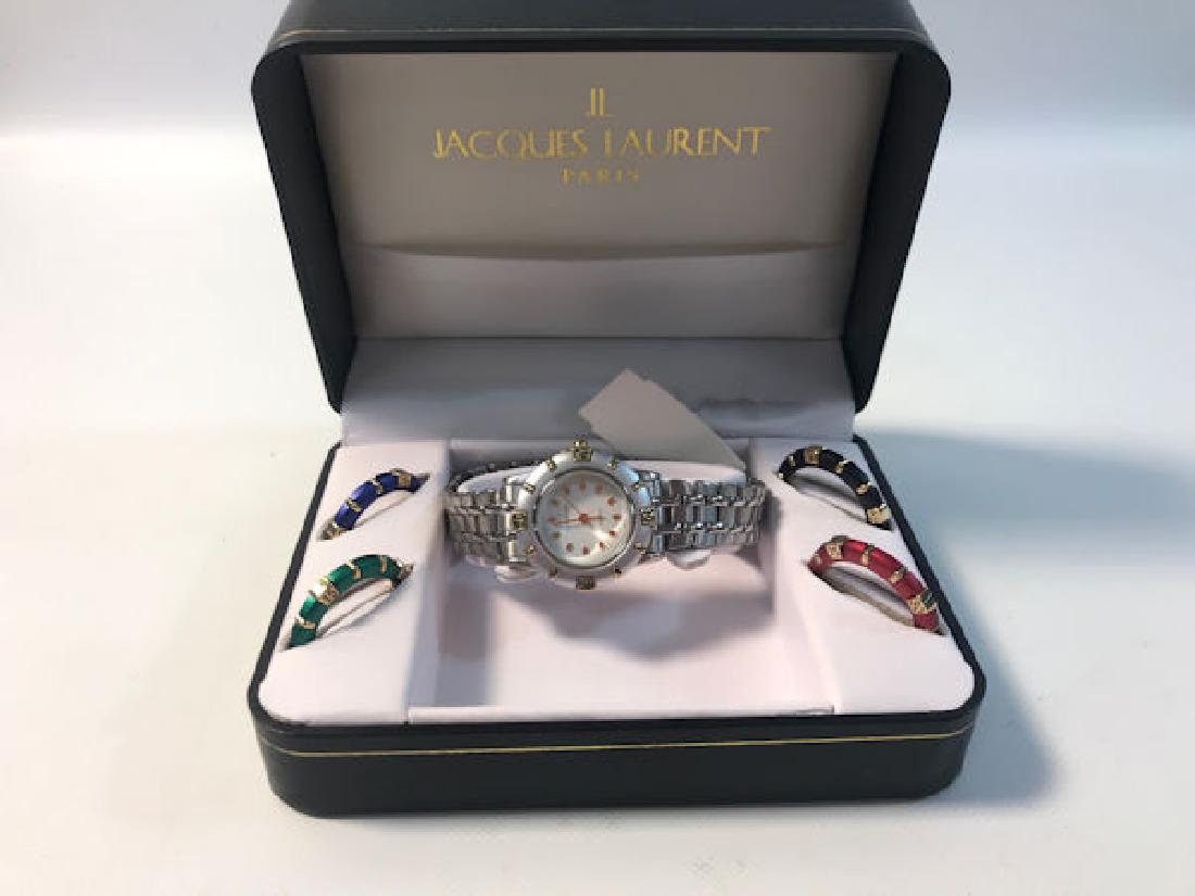 NEW OLD STOCK WRIST WATCH ~ SILVER TONE. J. LAURENT.: NEW OLD STOCK WRIST WATCH ~ SILVER TONE. J. LAURENT. REPLACEABLE CASE FRONTS INASSORTED COLORS. QUARTZ MOVEMENT.