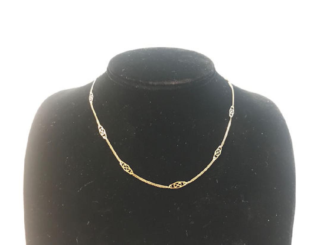 14KT GOLD NECKLACE ~ 16" CHOKER LENGTH FIGARO LINK: 14KT GOLD NECKLACE ~ 16" CHOKER LENGTH FIGARO LINK STYLE NECKLACE. ITALIAN MADEW/SPRING RING CLASP CLOSURE. POLISHED FINISH. 2.7 GRAMS TW.