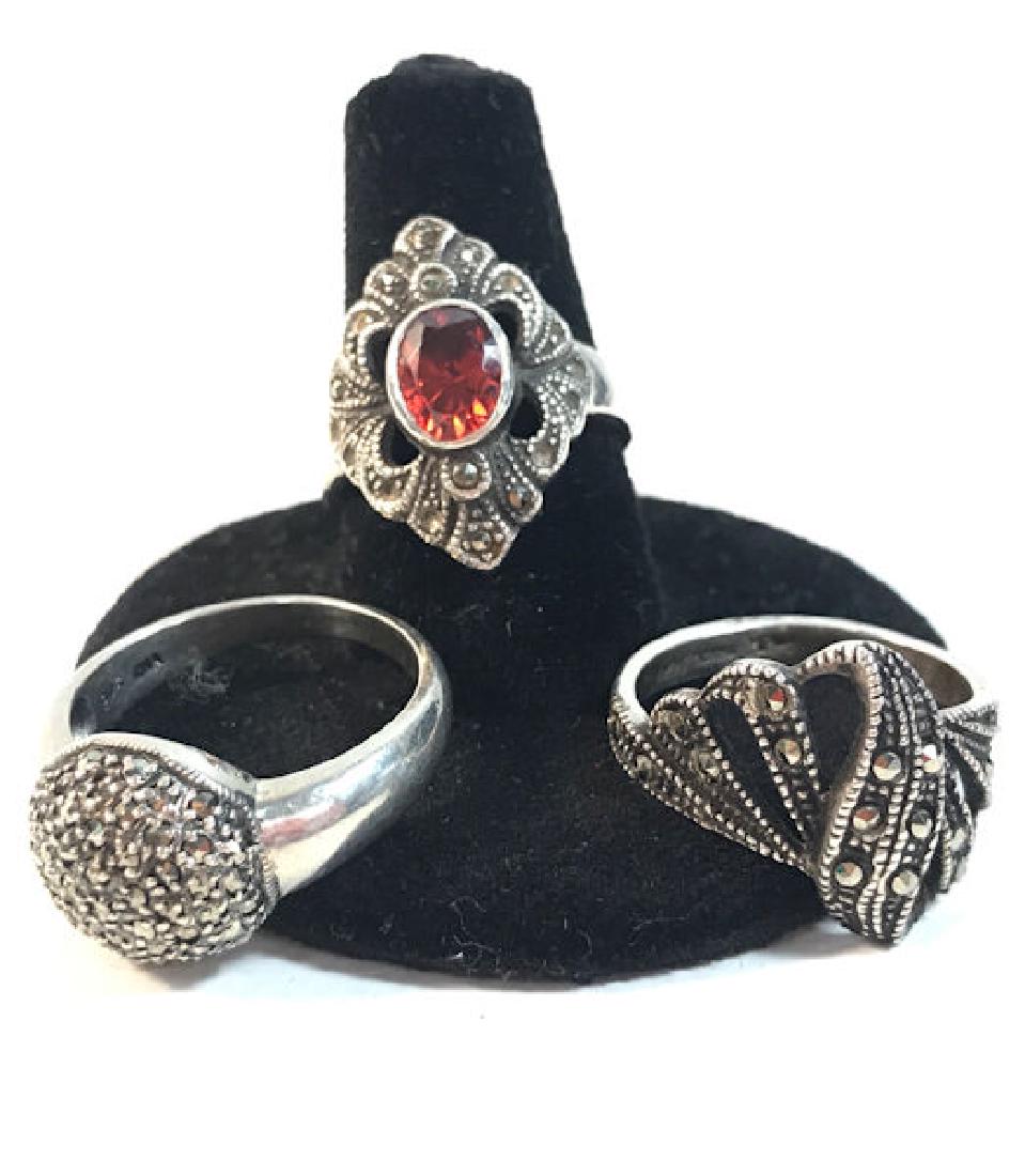THREE STERLING SILVER & MARCASITE RINGS ~ SIZES 6-8,: THREE STERLING SILVER & MARCASITE RINGS ~ SIZES 6-8, OPENWORK & CLUSTER DESIGNS(0.45 TROY OZ TW)