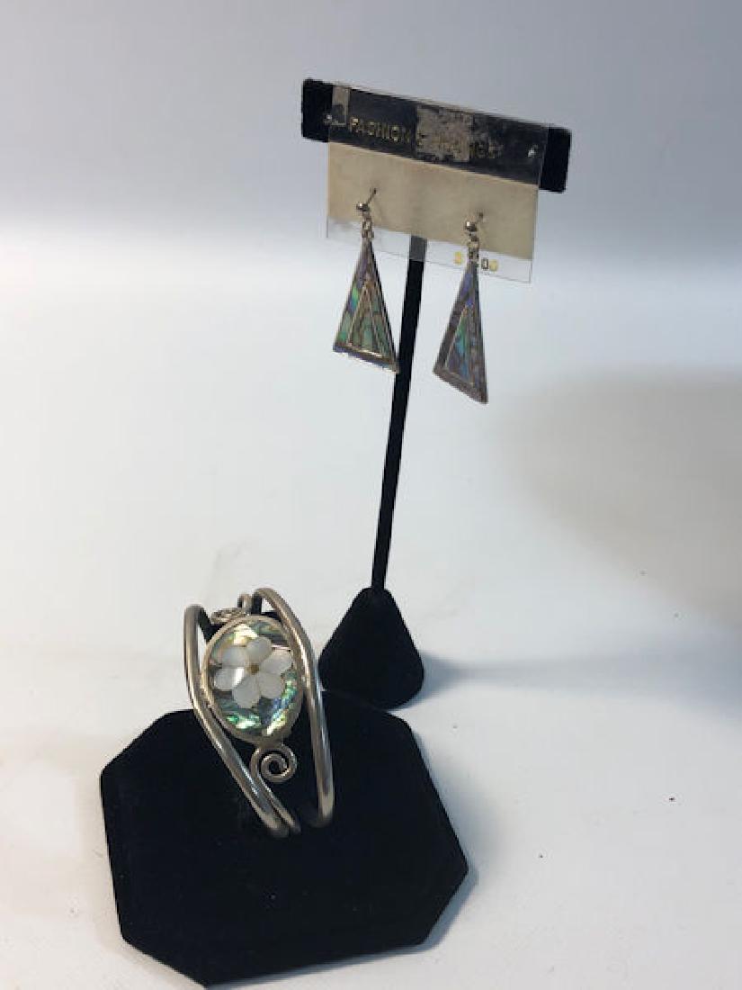 ABALONE FASHION JEWELRY LOT ~ OPENWORK CUFF (2.25"): ABALONE FASHION JEWELRY LOT ~ OPENWORK CUFF (2.25") W/MOTHER OF PEARL FLOWERINLAY ON ABALONE (SCROLL MOTIF). PAIR NOS DANGLE EARRINGS (TRIANGULAR SHAPE) ONCARD (KOREAN MADE).