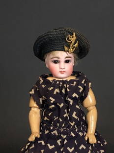 SWEET 9" CLOSED MOUTH SONNEBERG GIRL. SOLID DOME BISQUE: SWEET 9" CLOSED MOUTH SONNEBERG GIRL. SOLID DOME BISQUE SOCKET HEAD INCISED "1", ANTIQUE MOHAIR WIG, GLASS STATIONARY EYES AND PIERCED EARS. JOINTED COMPOSITION AND WOOD BODY WITH STRAIGHT WRISTS. ANT