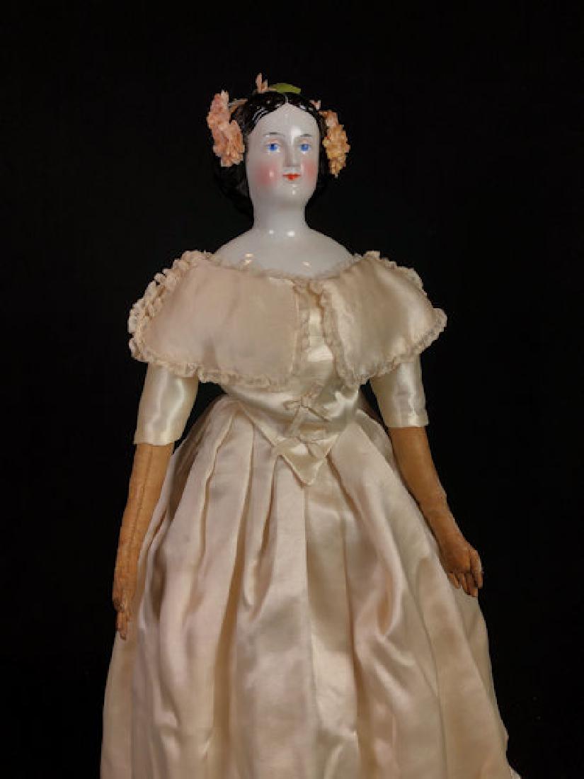 19" EARLY CHINA HEAD DOLL WITH COILED BUN HAIRSTYLE. (1 of 9)