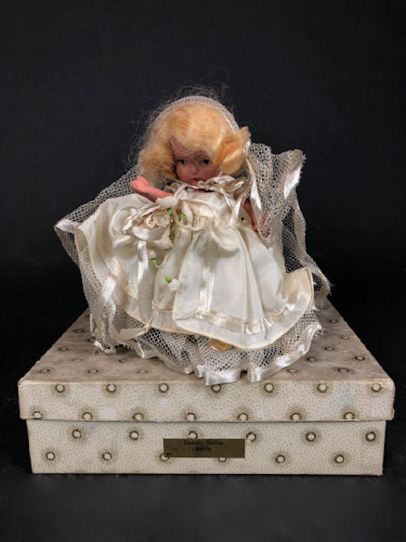 5½" JUDY ANN STORYBOOK DOLL IN ORIGINAL COSTUME: 5½" JUDY ANN STORYBOOK DOLL IN ORIGINAL COSTUME AND SUNBURST BOX. "JUDY ANN USA" MARK ON JOINTED PT BISQUE BODY, GOLD FOIL LABEL ON COSTUME AND BOX. PAINTED SILVER SHOES AND MOLDED SOCKS. EARLY