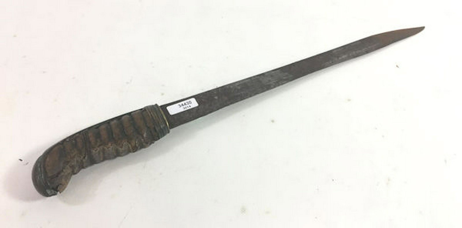 CIVIL WAR KNIFE MADE FROM A SWORD. SINGLE FULLER BRASS: CIVIL WAR KNIFE MADE FROM A SWORD. SINGLE FULLER BRASS GUARD WOODEN HANDLE WITH SOME SHARK SKIN COVER REMAINING. BRASS POMMEL WITH HAMMER TANG. 15¾" OAL