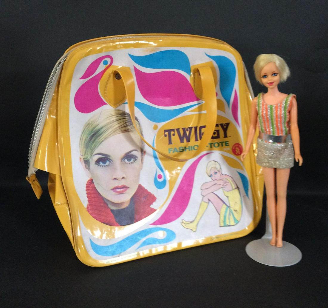 TWIGGY DOLL WITH FASHION-TOTE. DOLL WEARS TAGGED DRESS: TWIGGY DOLL WITH FASHION-TOTE. DOLL WEARS TAGGED DRESS ONLY FROM "TWIGGY TURNOUTS", KNEE JOINTS WORK WELL