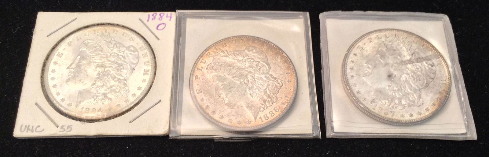 3 MORGAN SILVER DOLLARS INCLUDING 1884O, 1886, AND 1887 (1 of 2)