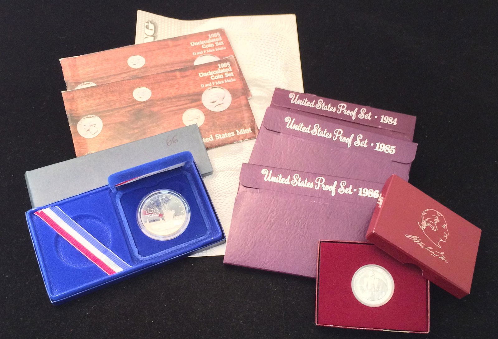 (1) 1981 UNCUT SHEET $1 FEDERAL RESERVE NOTES,: (1) 1981 UNCUT SHEET $1 FEDERAL RESERVE NOTES, 1984-1986 U.S. PROOF SETS, (2) 1985 U.S. MINT SETS, 1966 SPECIAL MINT SET, AND 1982 GEORGE WASHINGTON COMMEMORATIVE HALF DOLLAR PROOF, AND 1986 ELLIS ISL