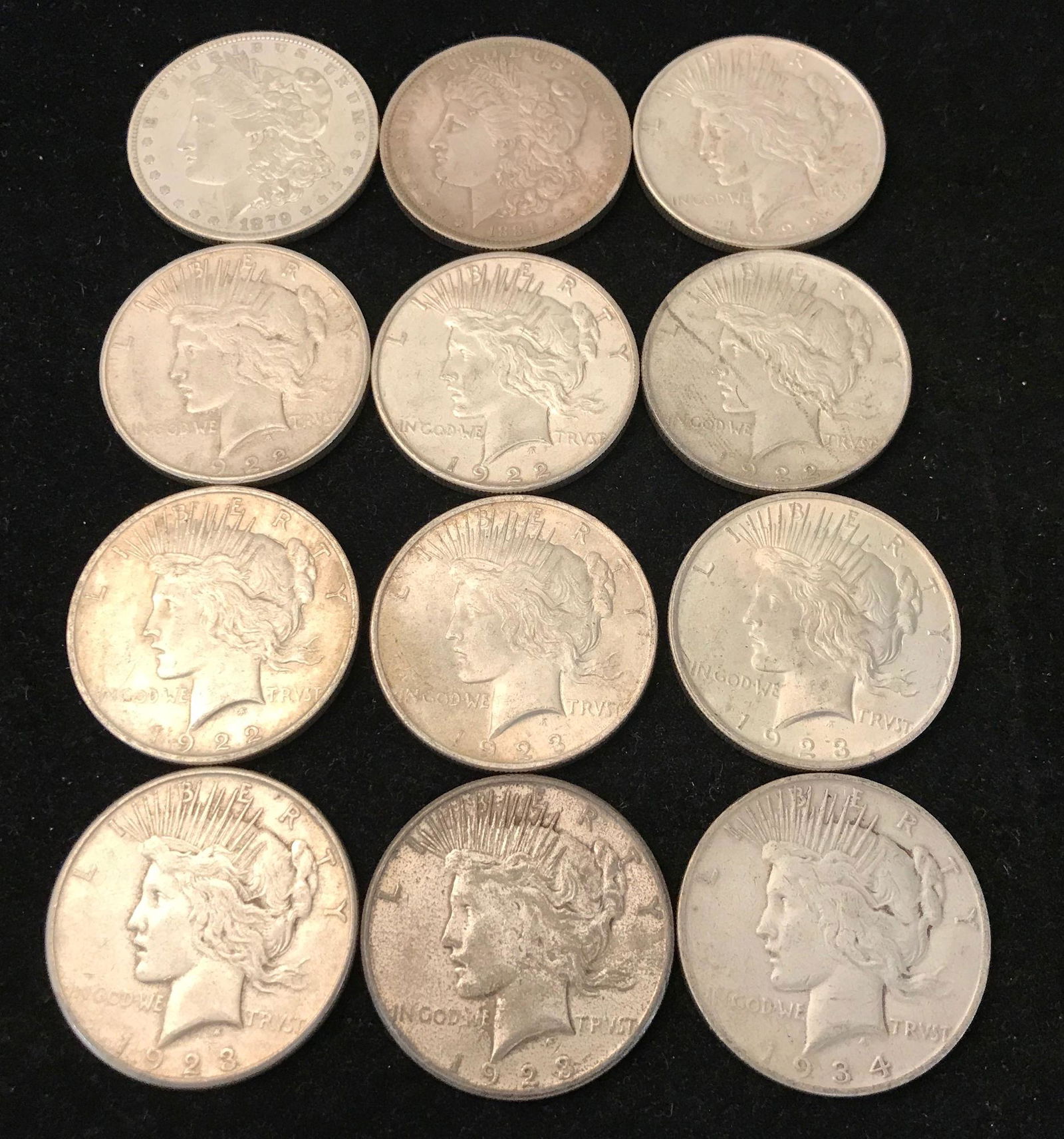 12 U.S. SILVER DOLLARS INCLUDING 1879 AND 1884O MORGAN (1 of 2)