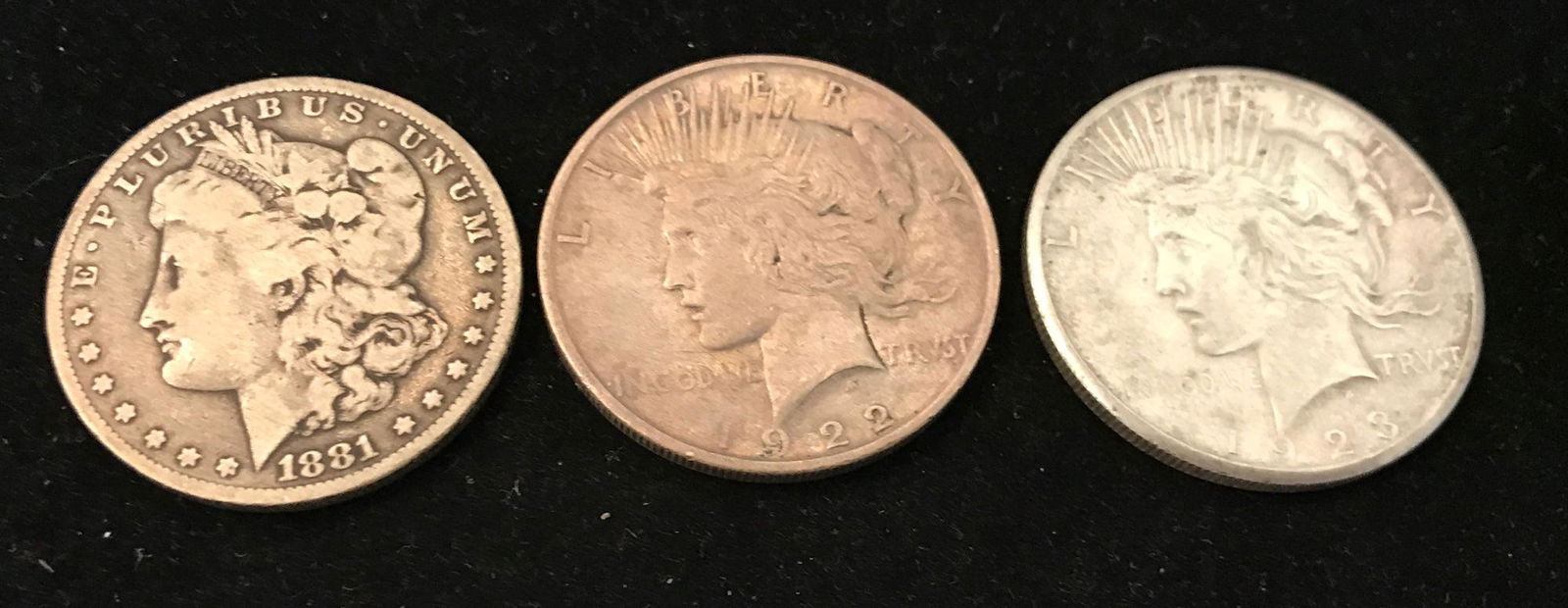 3 U.S. SILVER DOLLARS INCLUDING 1881 MORGAN AND 1922D (1 of 2)