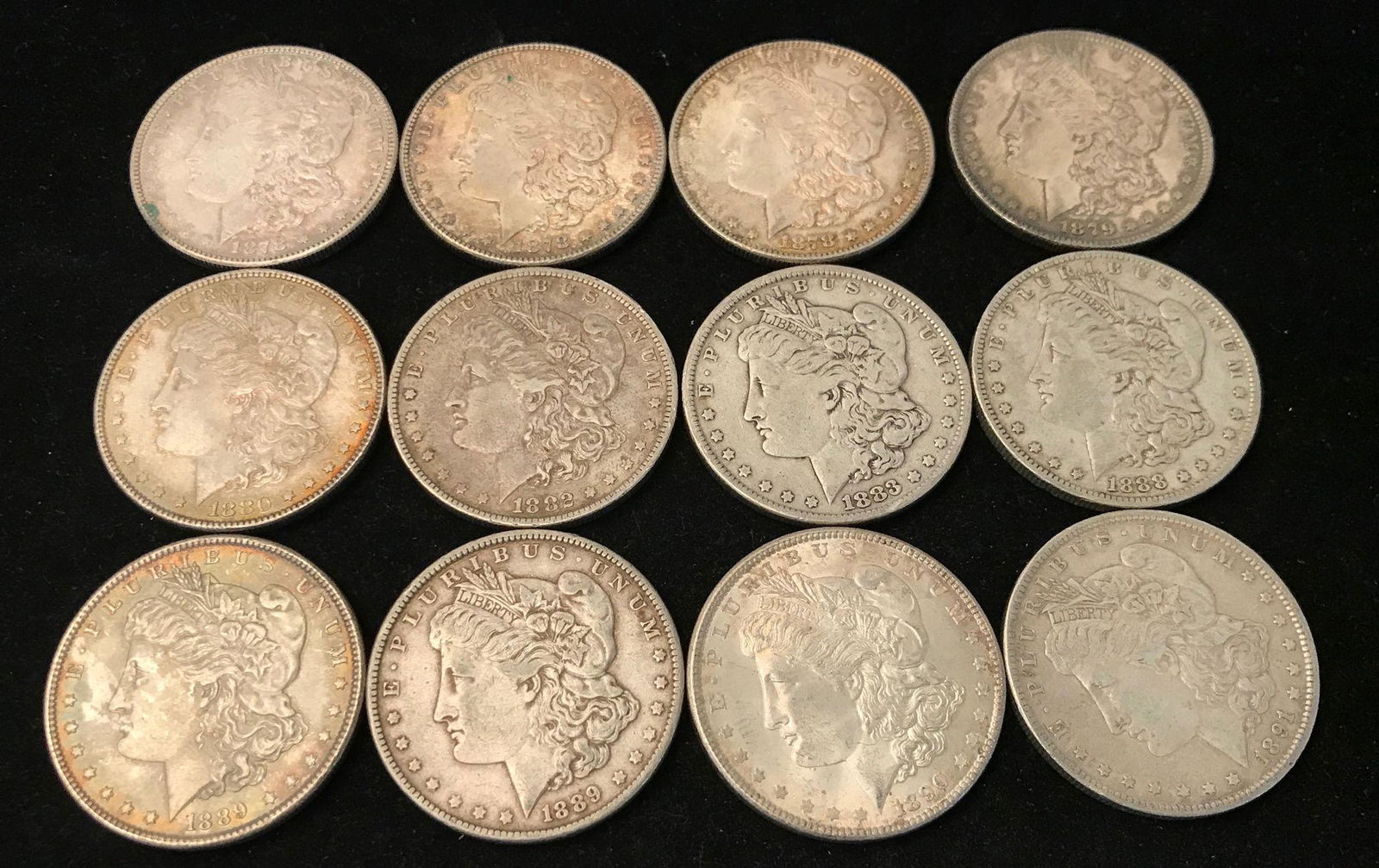12 MORGAN SILVER DOLLARS INCLUDING (3) 1878S, 1879, (1 of 2)