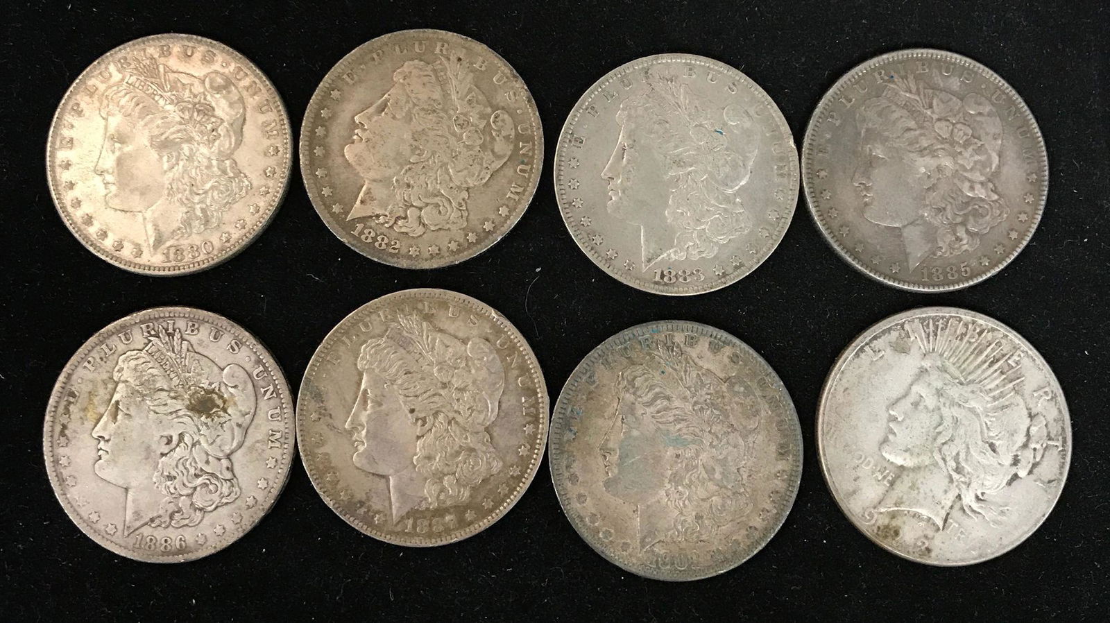 8 U.S. SILVER DOLLARS INCLUDING 1880O, 1882O, 1883O, (1 of 2)