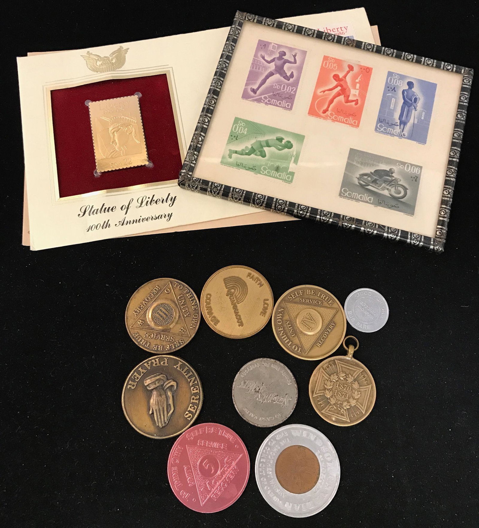 MIXED LOT INCLUDING FIRST DAY COVER, SOMALIA STAMPS,: MIXED LOT INCLUDING FIRST DAY COVER, SOMALIA STAMPS, AND 9 TOKENS